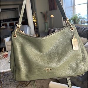 Moss green Coach crossbody with gold trim